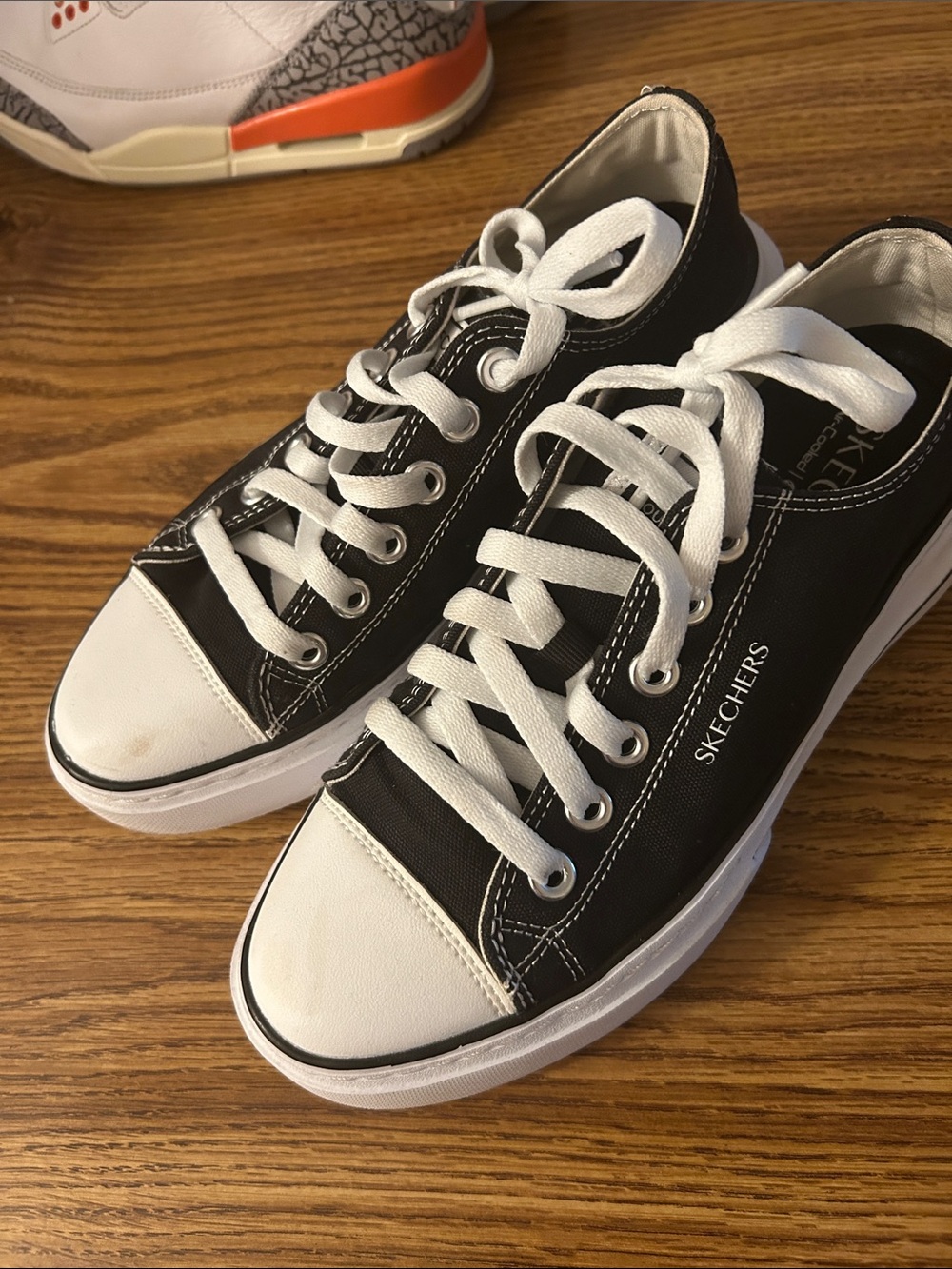 Skechers Black and White Low-Top Canvas Sneakers